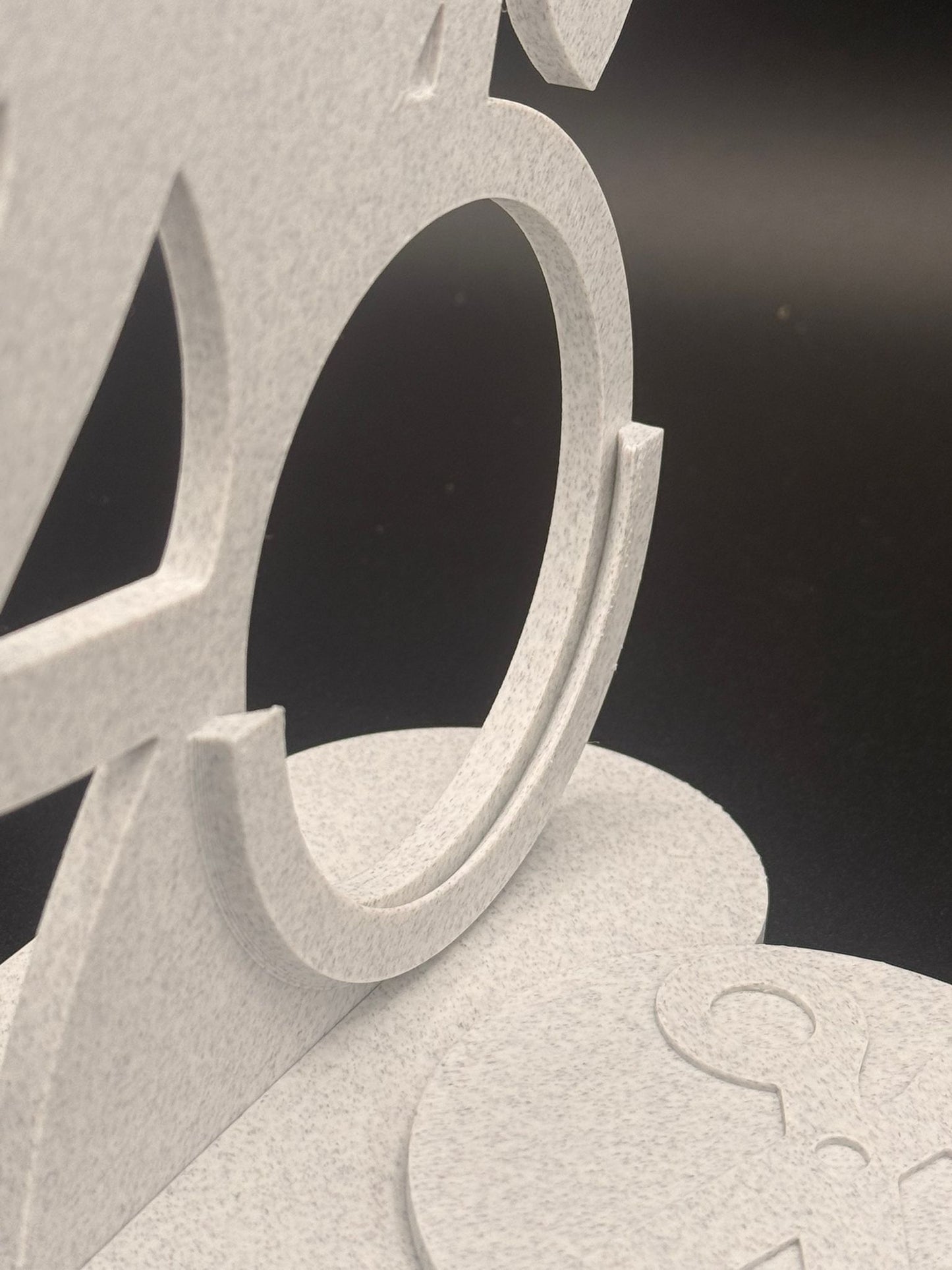 Ultrasound photograph holder - marble‑effect